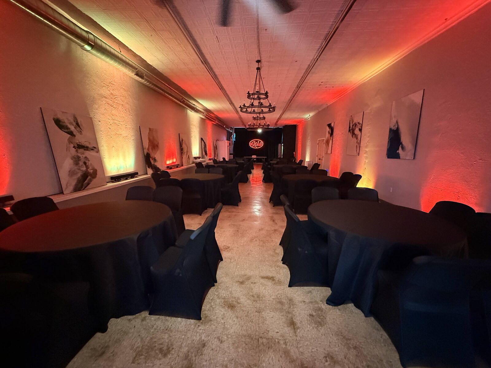 The Atrium lounge lit in warm red